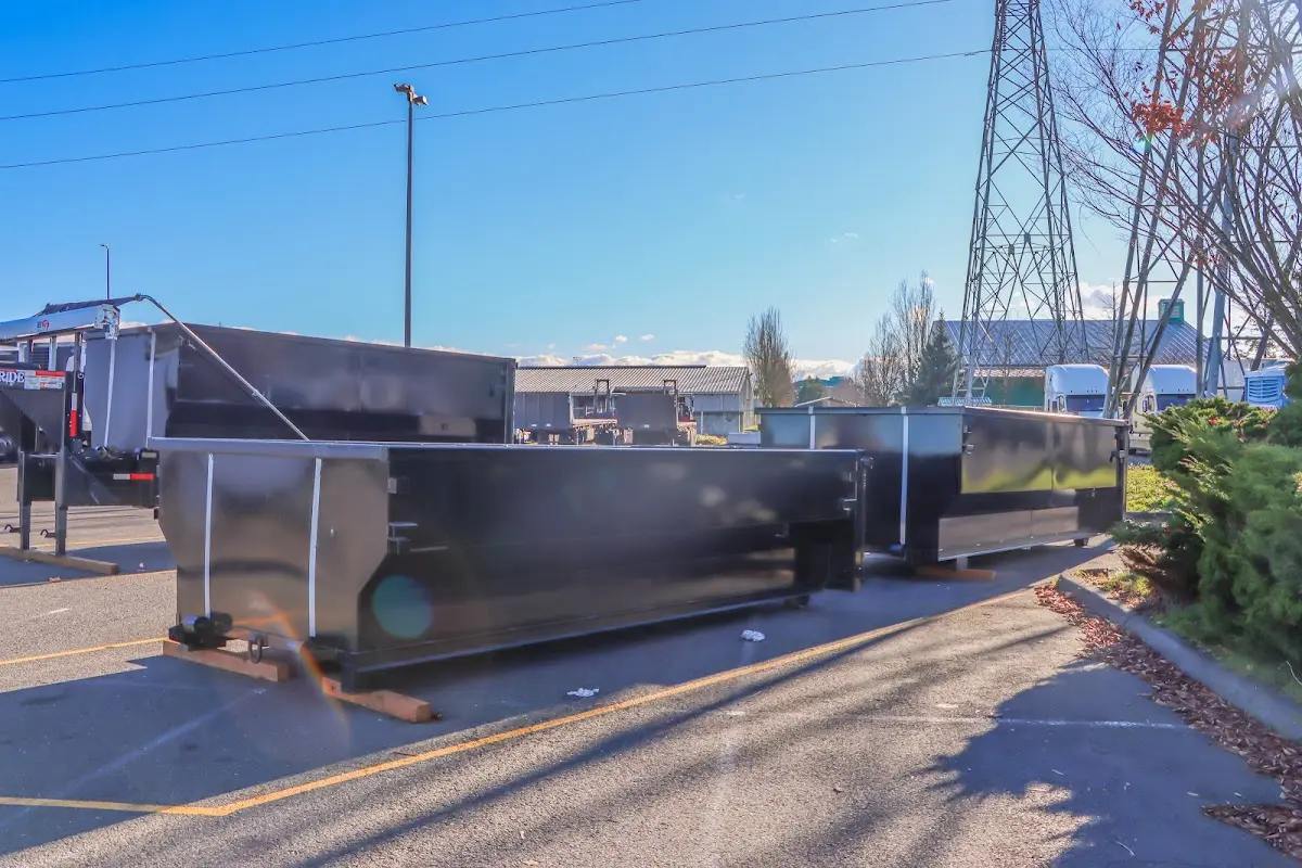 Roll-off dumpster ready for waste disposal at job site for Demolition Dumpster Rental in Oswego